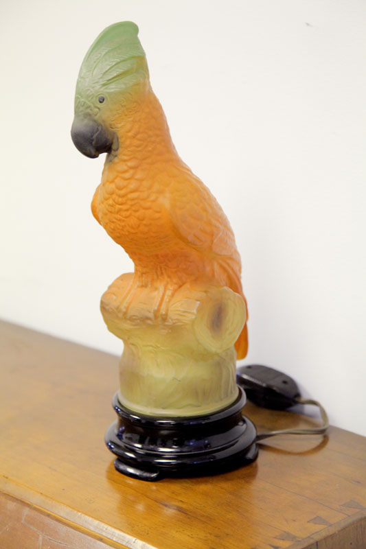 Appraisal: GLASS PARROT LAMP Attributed to Tiffin Painted parrot with black