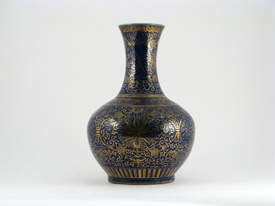 Appraisal: A Chinese blue-glazed bottle vase gilt decorated with lotus flower