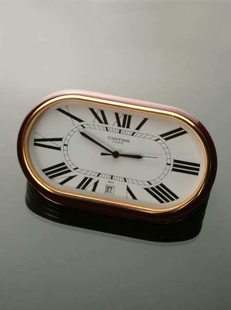 Appraisal: Brass and Rust Enamel Quartz Desk Clock Cartier Paris Recent