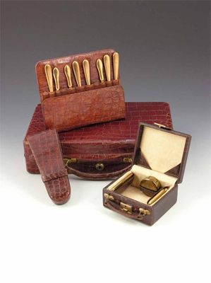 Appraisal: A crocodile jewellery case the plush lined interior with a