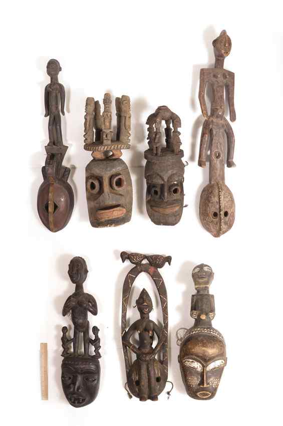 Appraisal: CARVED AFRICAN FIGURAL MASKS '' x '' x '' lbs