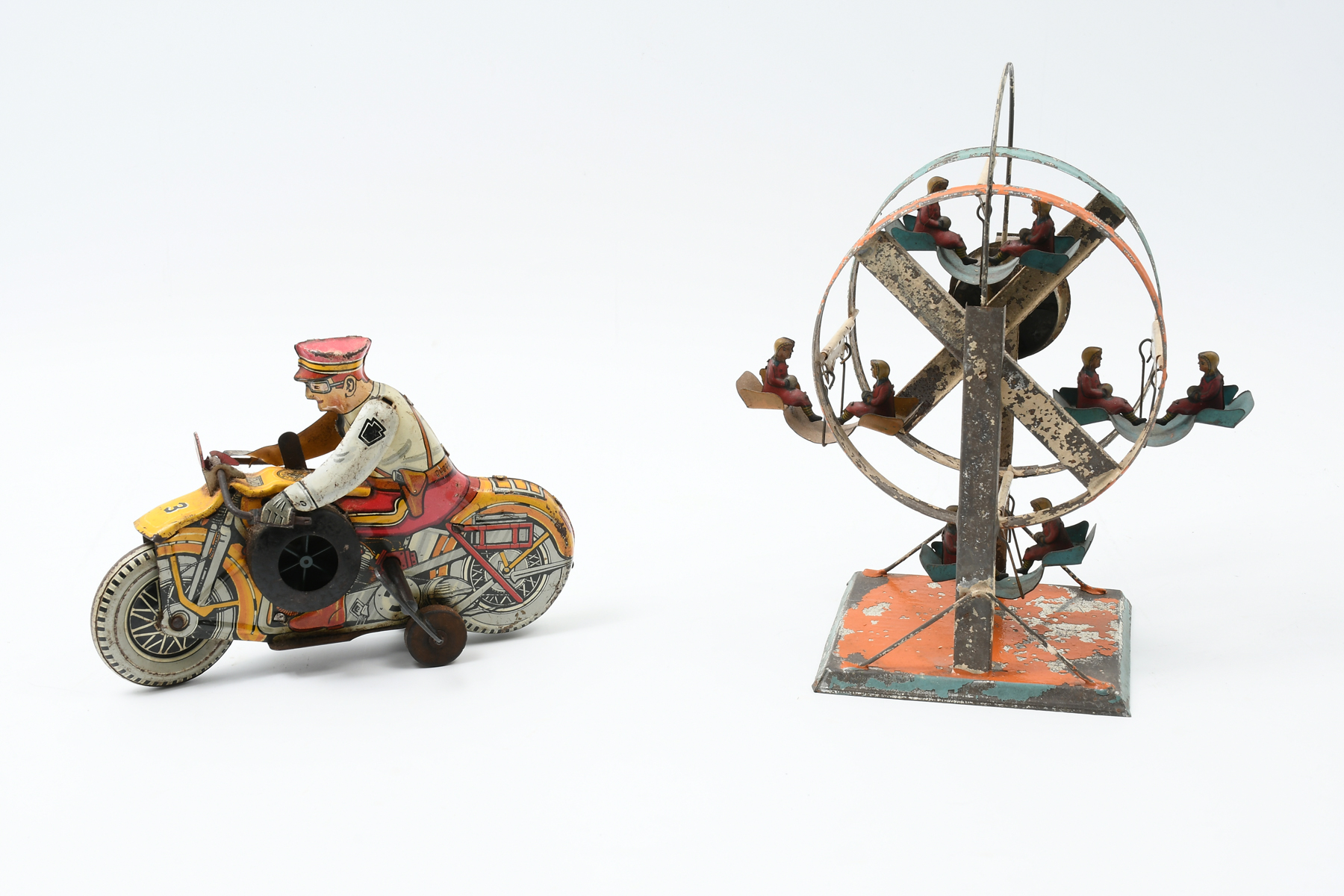 Appraisal: PC TIN WIND-UP TOYS Comprising - German Tin wind-up Ferris