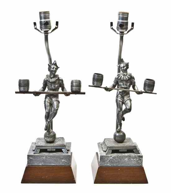 Appraisal: A Pair of Art Deco Style Cast Metal Figural Table