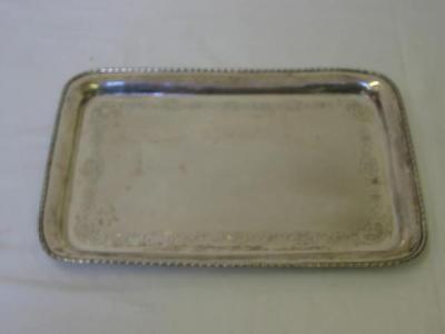 Appraisal: A TOILET TRAY of rounded oblong form the flared rim