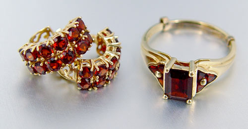 Appraisal: ESTATE GARNET RING AND EARRINGS Yellow gold ring marked k