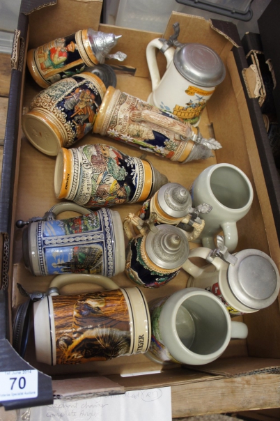 Appraisal: A Collection of Various German Embossed Porcelain Beer Steins with