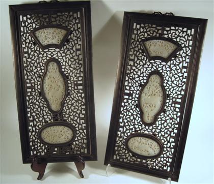 Appraisal: Pair of Chinese white jade insert and hardwood panels The