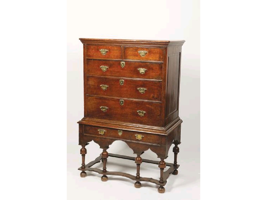 Appraisal: A WILLIAM AND MARY OAK CHEST ON STAND the upper