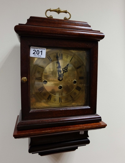 Appraisal: Reproduction quality Mahogany Westminster chime clock with wall bracket German