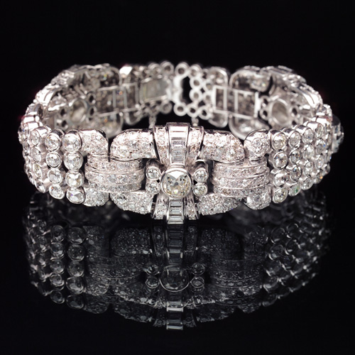 Appraisal: ART DECO Diamond and platinum strap bracelet four cushion-shaped pav