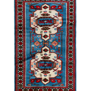 Appraisal: A Turkish Wool Rug Second Half th Century feet inch