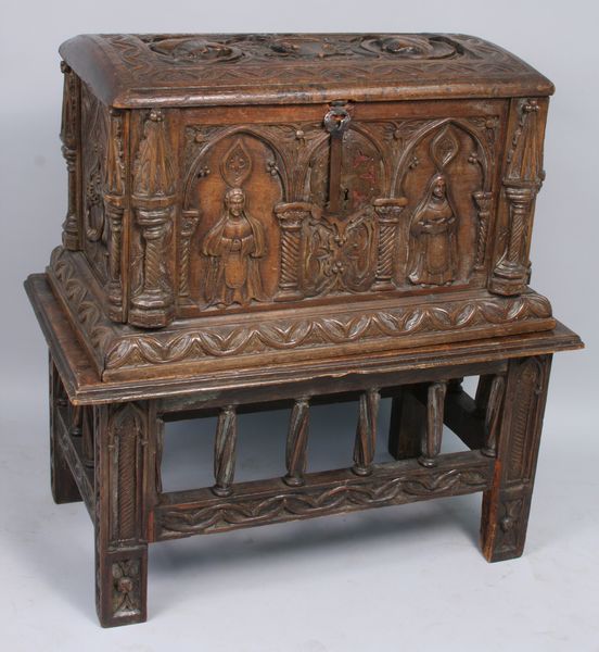 Appraisal: Possibly th Century Spanish wooden chest-on-stand having carved portraits of