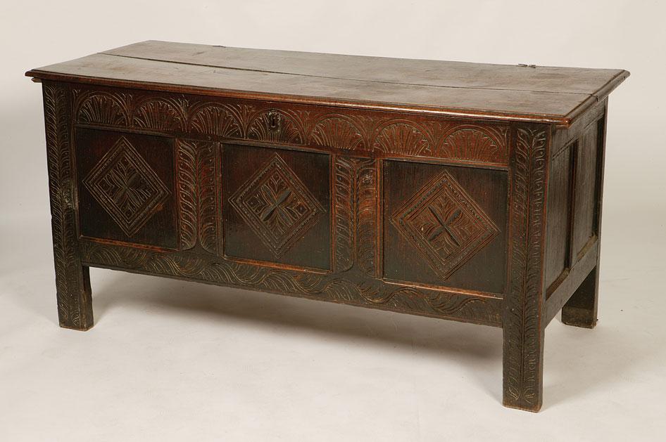 Appraisal: A CHARLES II OAK COFFER the rectangular top with a