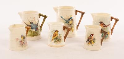 Appraisal: Six Royal Worcester ribbed jugs painted birds four signed William