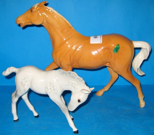 Appraisal: Beswick Spirit of Fire Palomino And Large Foal