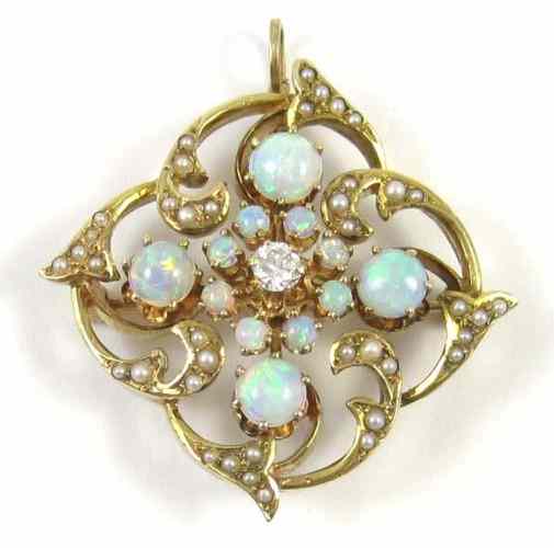 Appraisal: OPAL SEED PEARL AND DIAMOND PENDANT BROOCH k yellow gold