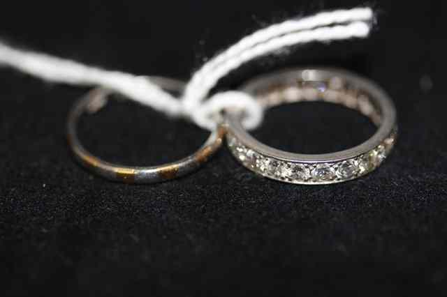 Appraisal: A DIAMOND SET FULL ETERNITY RING bead set with twenty