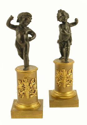 Appraisal: A pair of late th century French bronze putto on