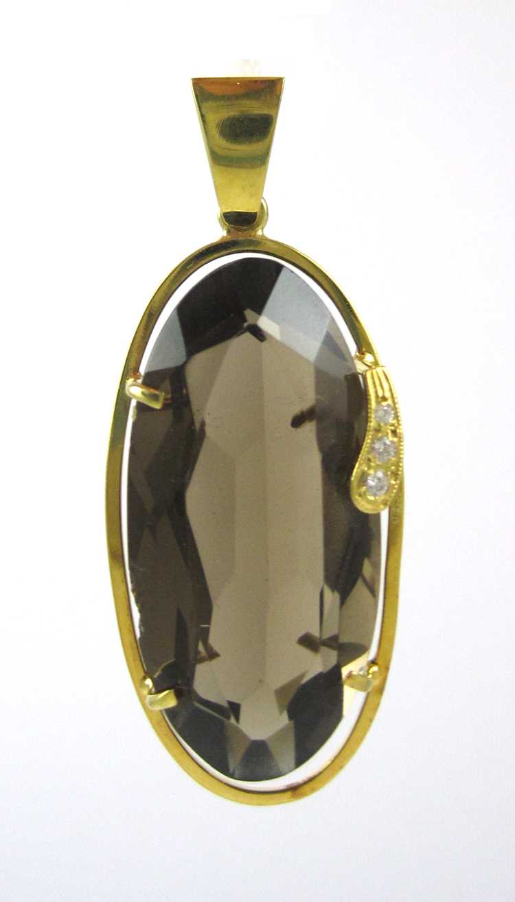 Appraisal: SMOKY QUARTZ DIAMOND AND YELLOW GOLD PENDANT The k gold