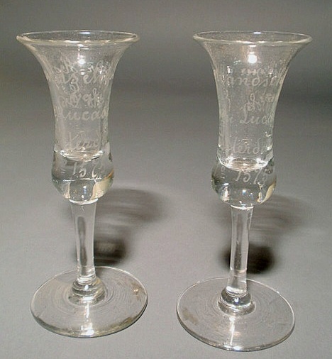 Appraisal: Pair of stemmed clear glass wines with inscriptions in Dutch