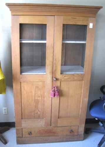 Appraisal: PINE KITCHEN CUPBOARD American c having screen vented doors and