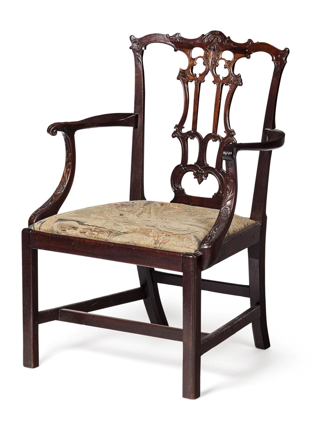 Appraisal: GEORGE III MAHOGANY OPEN ARMCHAIR CIRCA the foliate carved serpentine