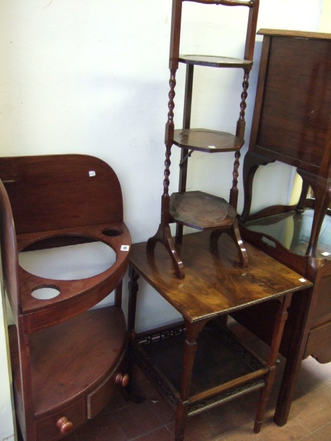 Appraisal: An early th century mahogany corner washstand together with a