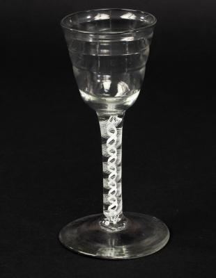 Appraisal: An th Century wine glass with double series opaque twist