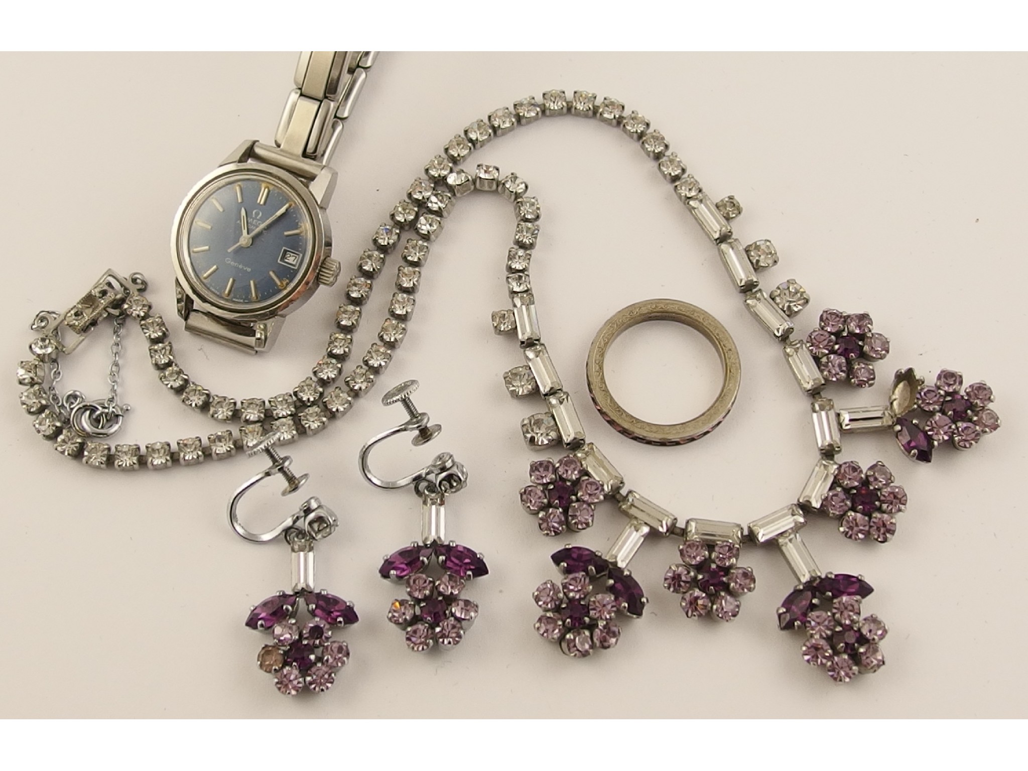 Appraisal: A floral themed costume jewellery necklace with matching earrings and