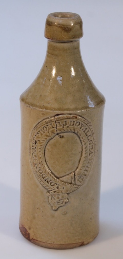 Appraisal: A London Stout Grantham porter's stoneware bottle the shouldered cylindrical