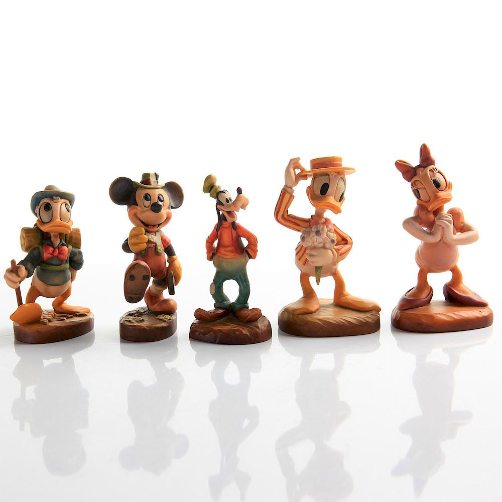 Appraisal: ANRI CARVED WOOD DISNEY FIGURINES Disney cartoon characters original boxes