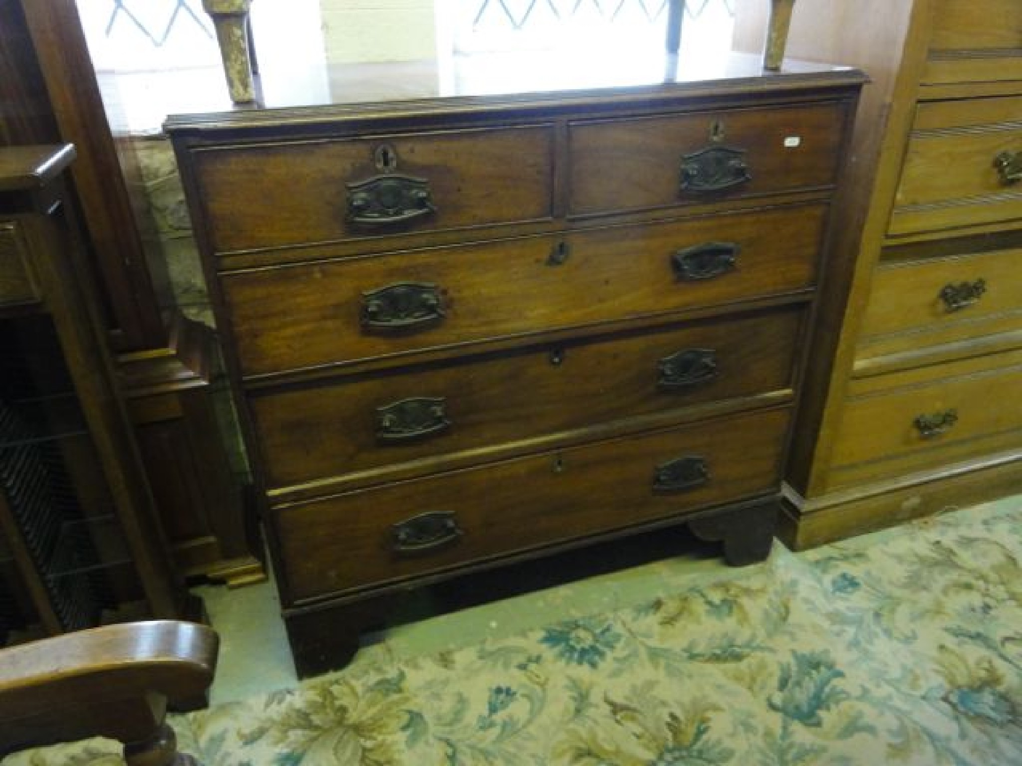 Appraisal: A th century mahogany and pine sided bedroom chest of