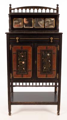 Appraisal: An Aesthetic movement ebonised cabinet by G Davis late J