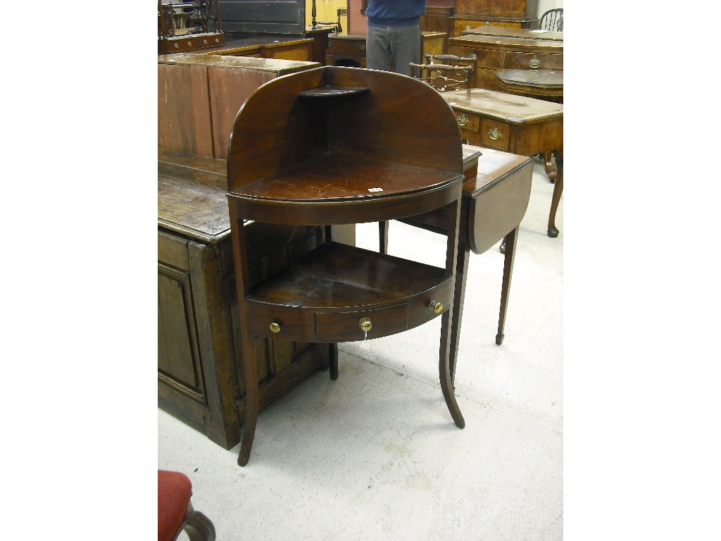 Appraisal: George III mahogany bow fronted two tier corner washstand the