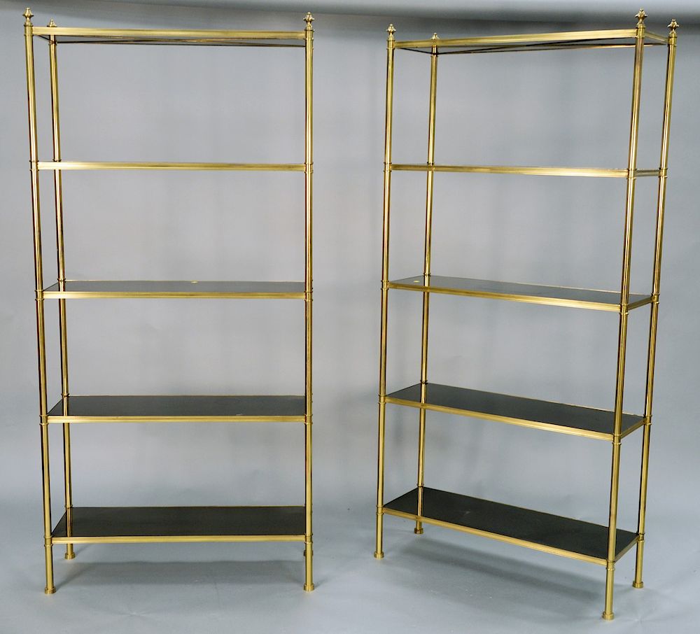 Appraisal: Pair of Maison Jansen modern brass etageres having five ebonized