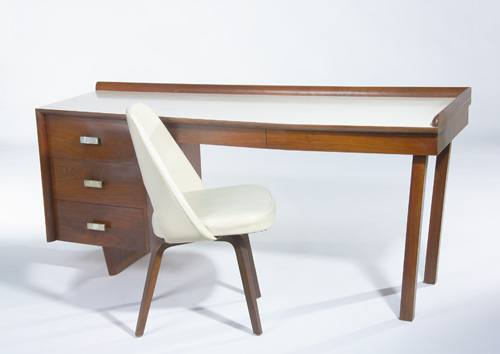 Appraisal: SAMSON BERMAN Special-order single-pedestal desk of walnut with champagne formica