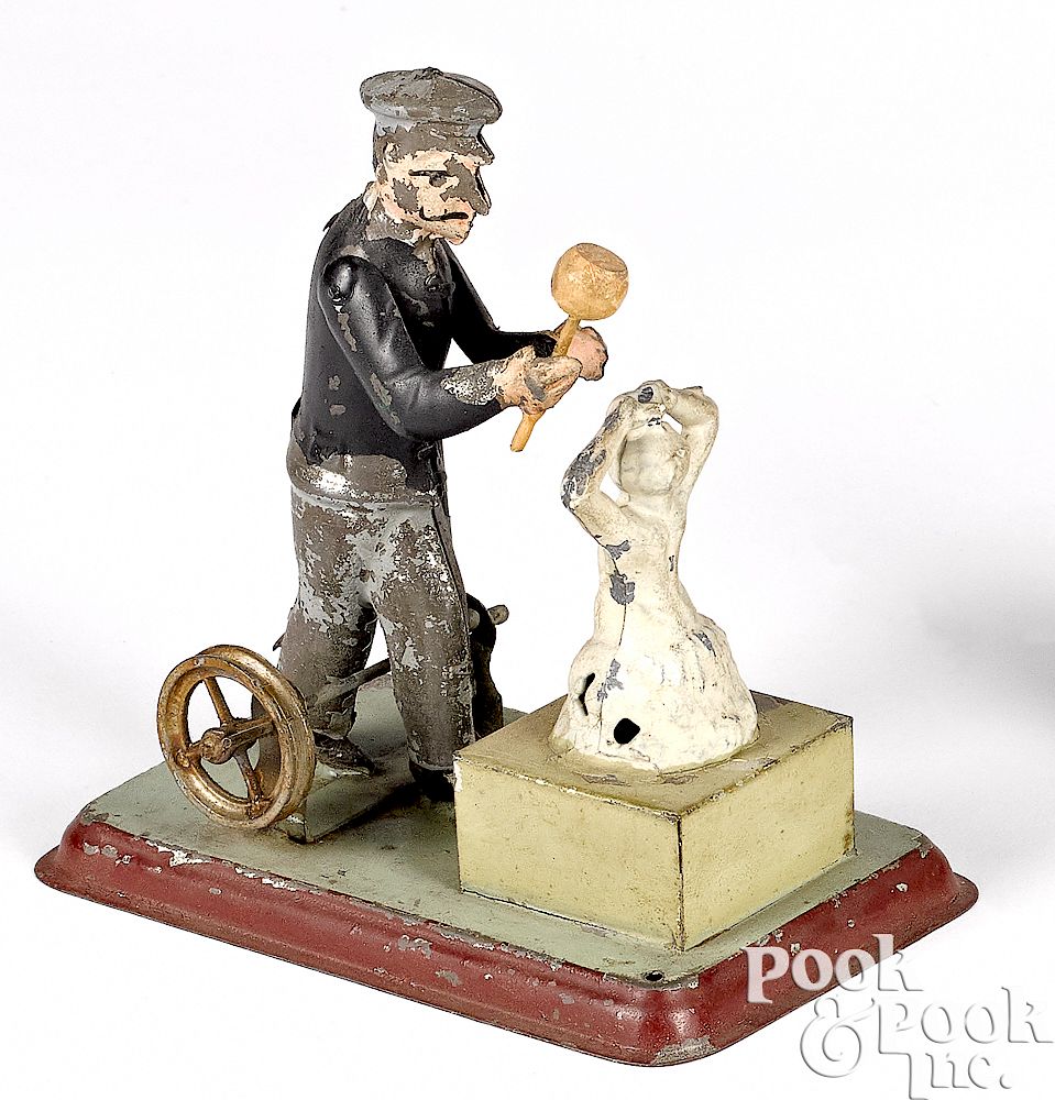 Appraisal: Wunderlich tin sculptor steam toy accessory Wunderlich painted tin sculptor