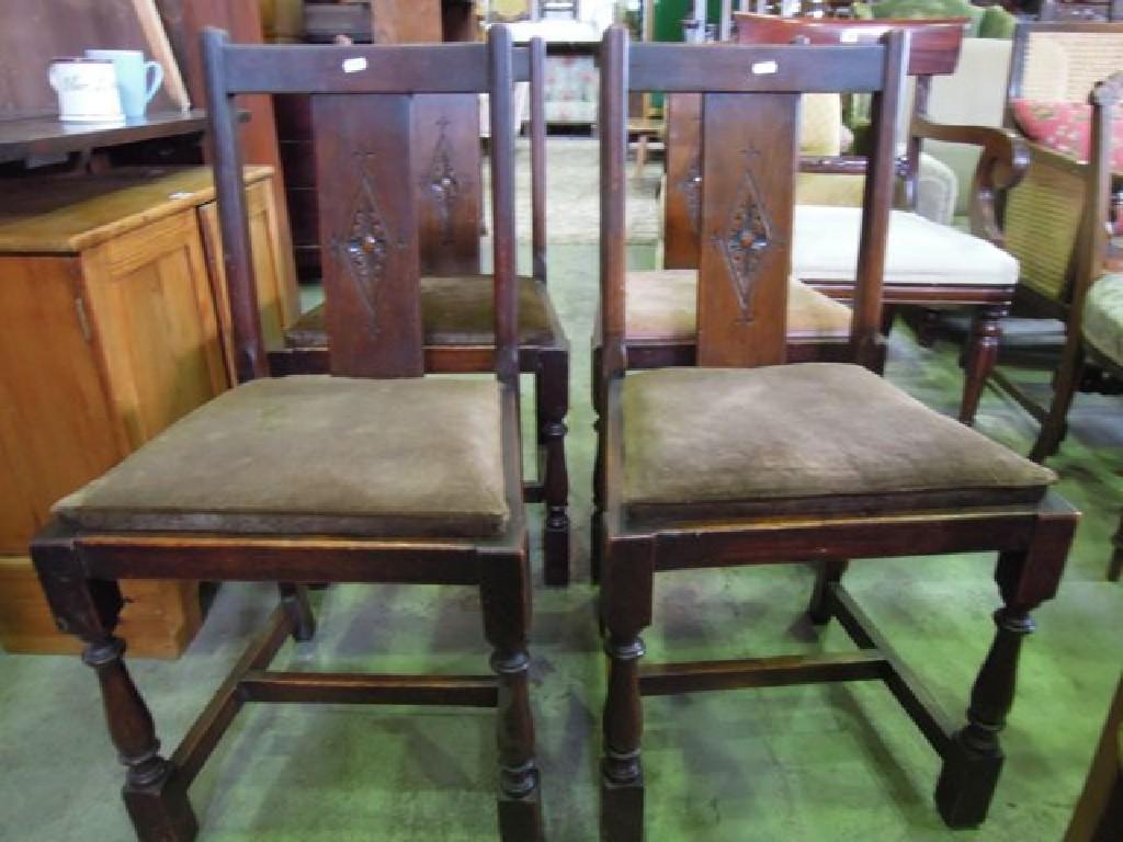 Appraisal: A set of four good quality reproduction oak dining chairs