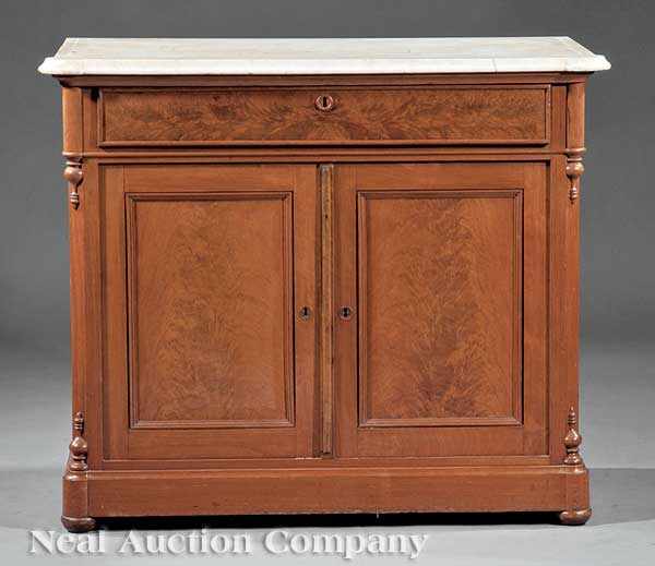 Appraisal: An American Renaissance Walnut Washstand c molded marble top above