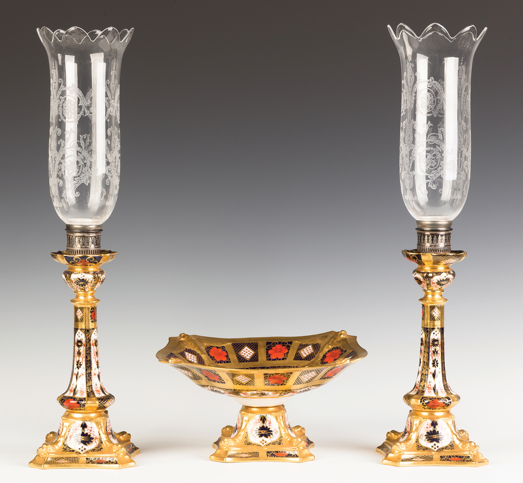 Appraisal: Royal Crown Darby Compote with Matching Candlesticks Etched hurricane shades