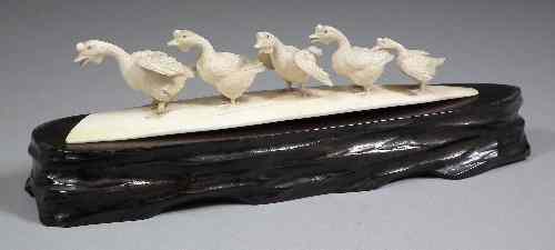 Appraisal: A Japanese carved ivory group of five graduated geese on