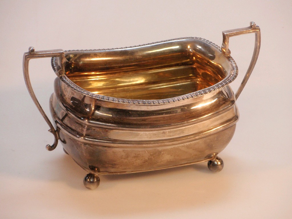 Appraisal: A George V silver two-handled sugar bowl with gadrooned rim