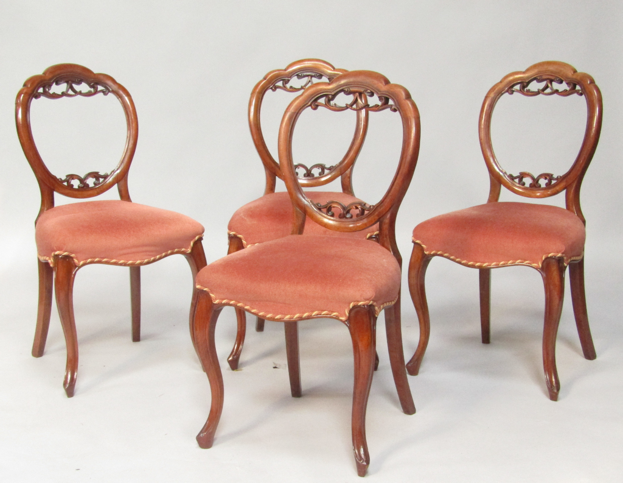 Appraisal: A set of four Victorian mahogany balloon back single dining