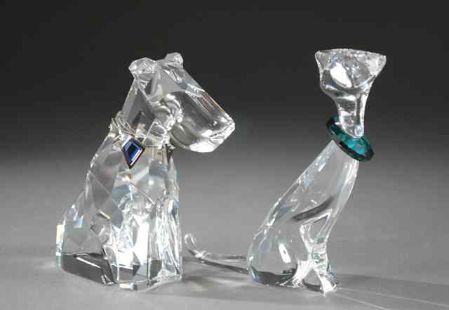 Appraisal: TWO SWAROVSKI CRYSTAL ANIMAL FIGURINES dog seated with silvered collar