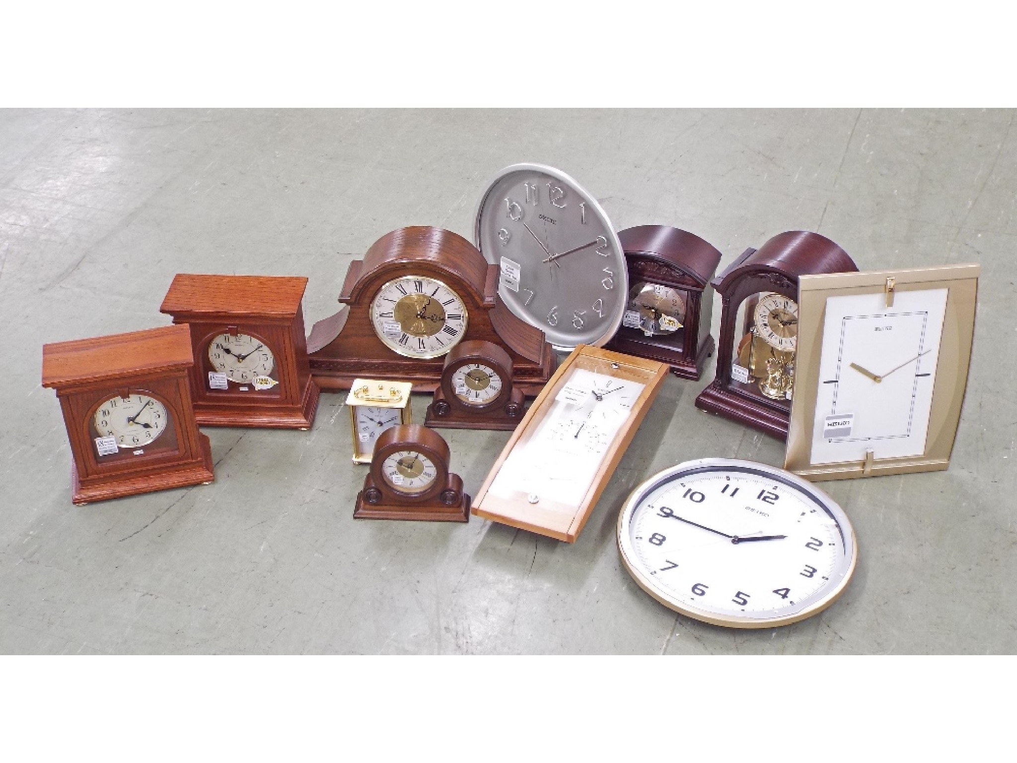 Appraisal: Twelve various new and boxed Seiko wall and mantel clocks