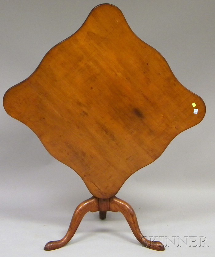 Appraisal: Maple and Cherry Serpentine Tilt-top Tea Table New England late