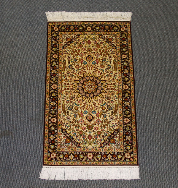 Appraisal: Silk hand woven oriental rug vibrant surface with long fringe