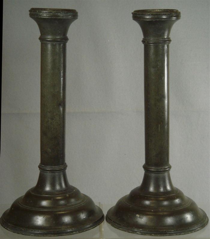 Appraisal: Pr weighted tin column form candlesticks on round bases tall