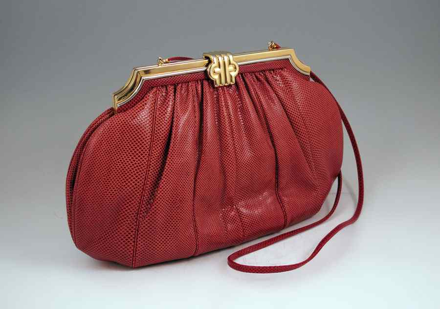 Appraisal: JUDITH LEIBER SPICY RED REPTILE LEATHER PURSE Gold tone frame