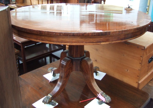 Appraisal: A George IV rosewood snap top breakfast table the octagonal